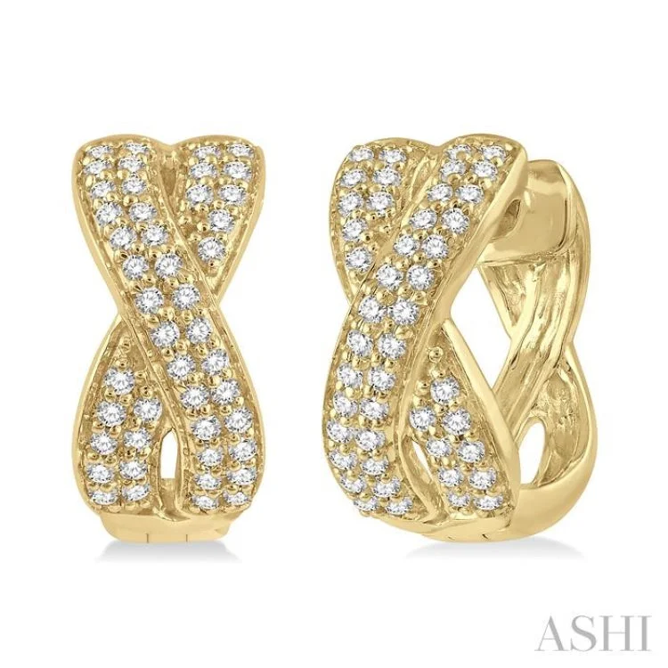 Women’s fashion earrings-1/3 Ctw Crossover Round Cut Diamond Petite Huggie Earrings in 14K Yellow Gold