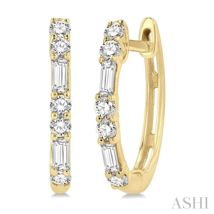 Women’s rose gold earrings-1/3 ctw Baguette and Round Cut Diamond Petite Huggies in 14K Yellow Gold