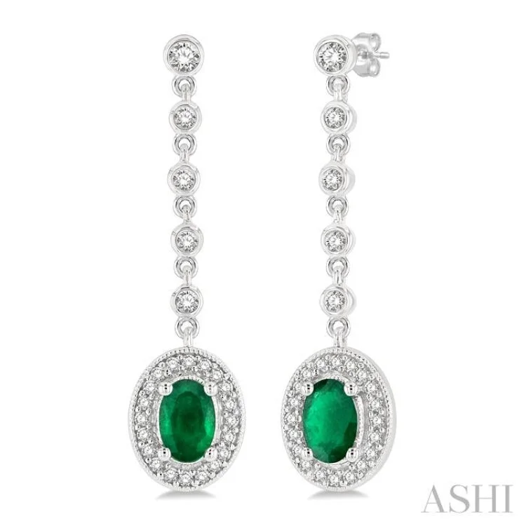 Women’s fashion crystal earrings-3/8 Ctw Oval Shape 6x4MM Emerald and Round Cut Diamond Drop Earrings in 14K White Gold