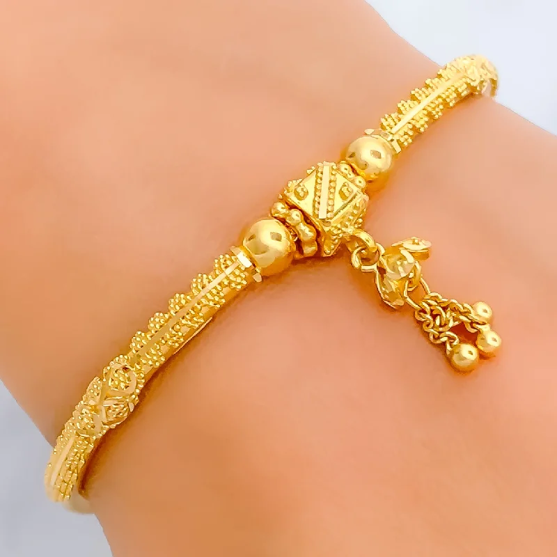 Women’s beaded bracelets-Delightful Dangling 22k Gold Flexi Bangle Bracelet