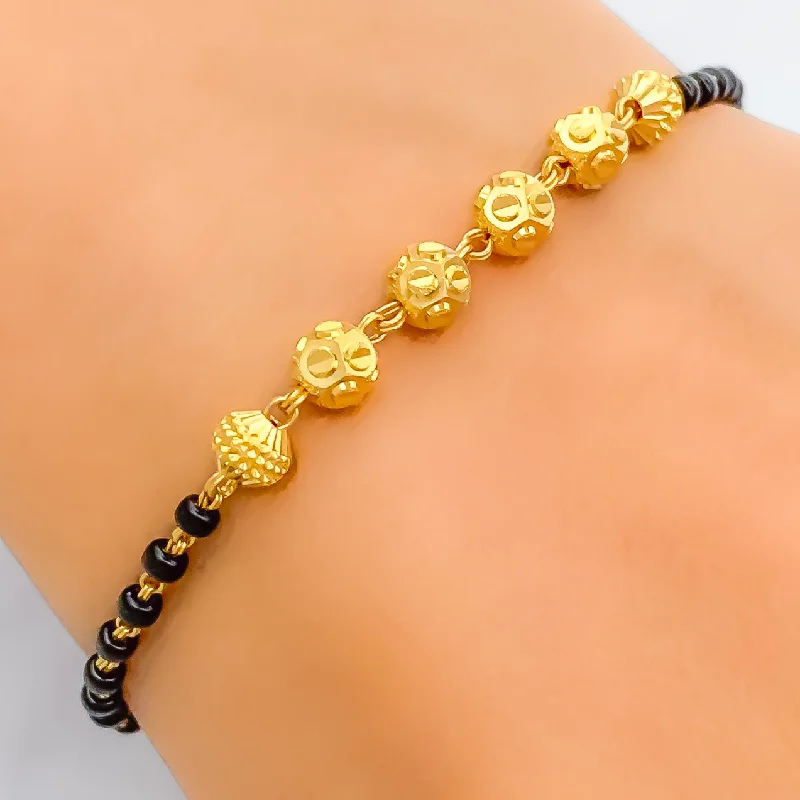 Women’s charm bracelets-Refined Dotted 22k Gold Black Bead Bracelet