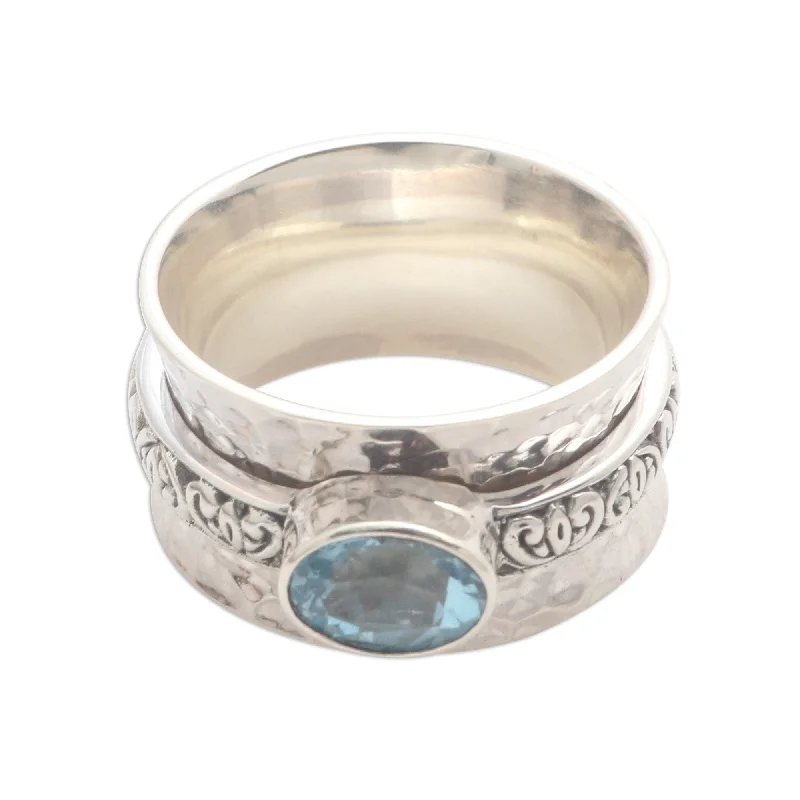 Women’s emerald cut rings-Novica Handmade Protected Beauty Blue Topaz Meditation Spinner Ring