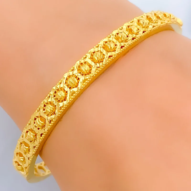 Women’s handmade bracelets-Striking Reflective Orb 22k Gold Bangle Bracelet