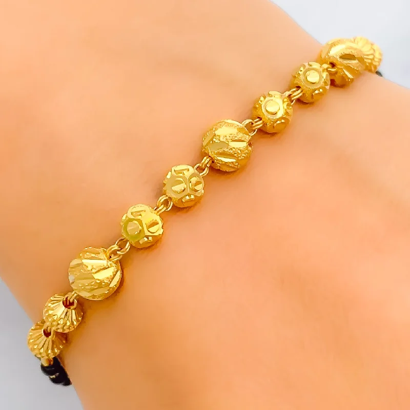 Women’s pearl bracelets-Jazzy Engraved 22k Gold Black Bead Bracelet