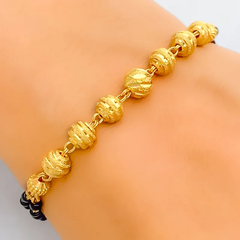 Women’s engraved bracelets-Majestic Multi-Orb 22k Gold Black Bead Bracelet