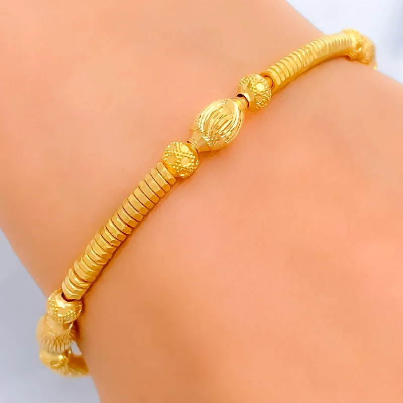 Women’s bangle bracelets-Lavish Wavy 22k Gold Bangle Bracelet