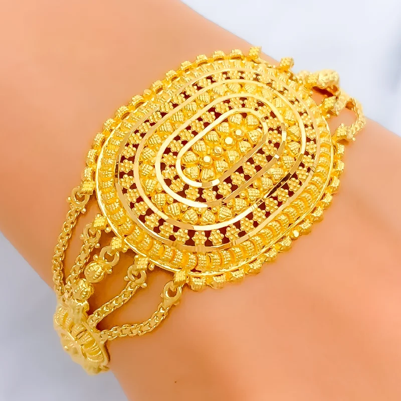 Women’s cute charm bracelets-Extravagant Paisley Accented 22k Gold Statement Bracelet