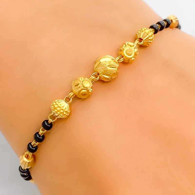 Women’s crystal bracelets-Graduating Five Bead 22k Gold Black Bead Bracelet